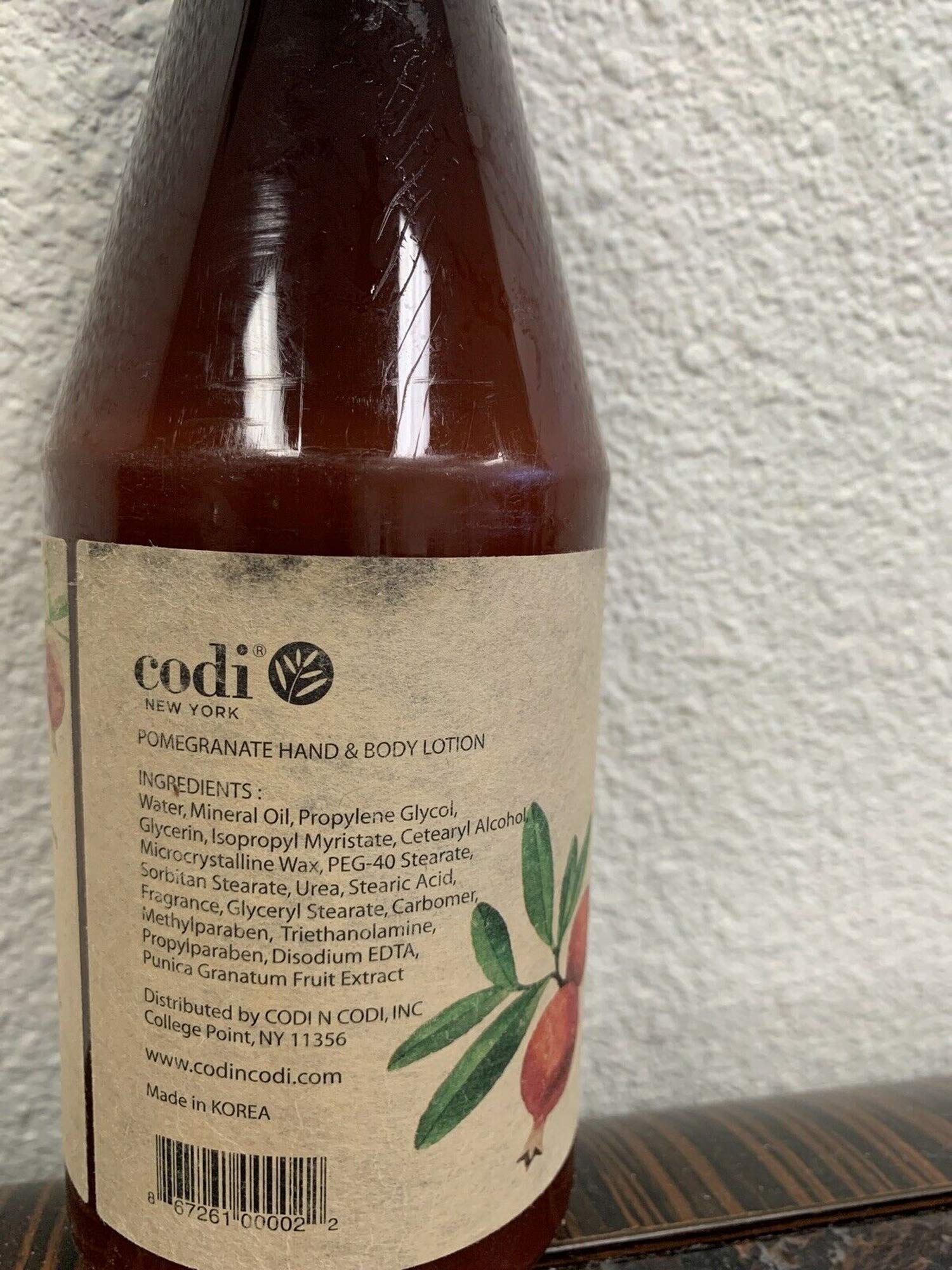 CODi Pomegranate Lotion applied to hand demonstrates fast absorption.