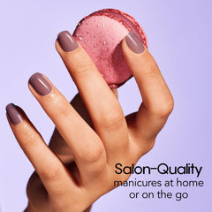 Color Street Macaron nail strips being peeled for easy peel-and-apply at home.