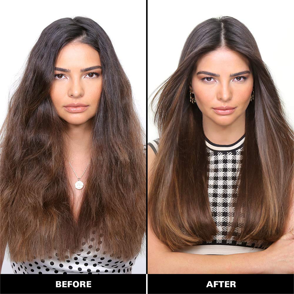 COLOR WOW Dream Coat spray being held, demonstrating easy application and frizz control