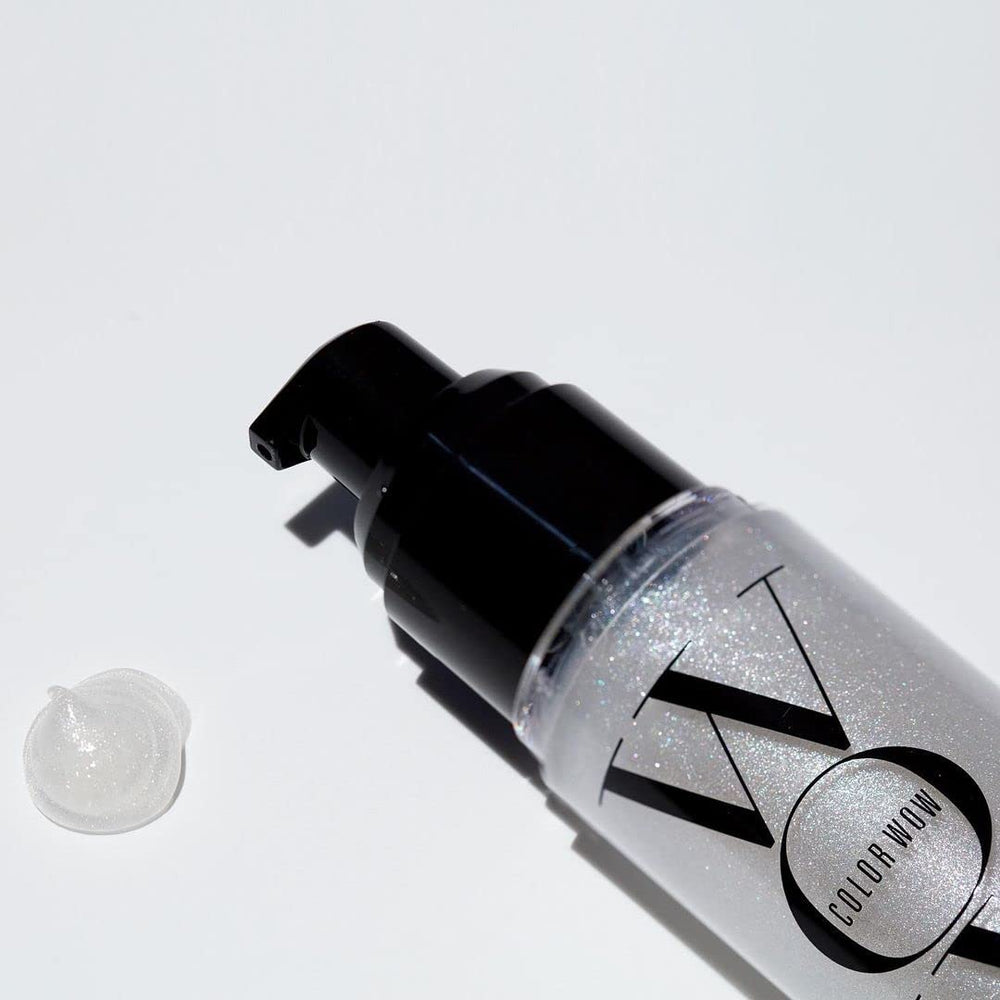 COLOR WOW bottle next to hand showing travel-friendly size and convenient portioning