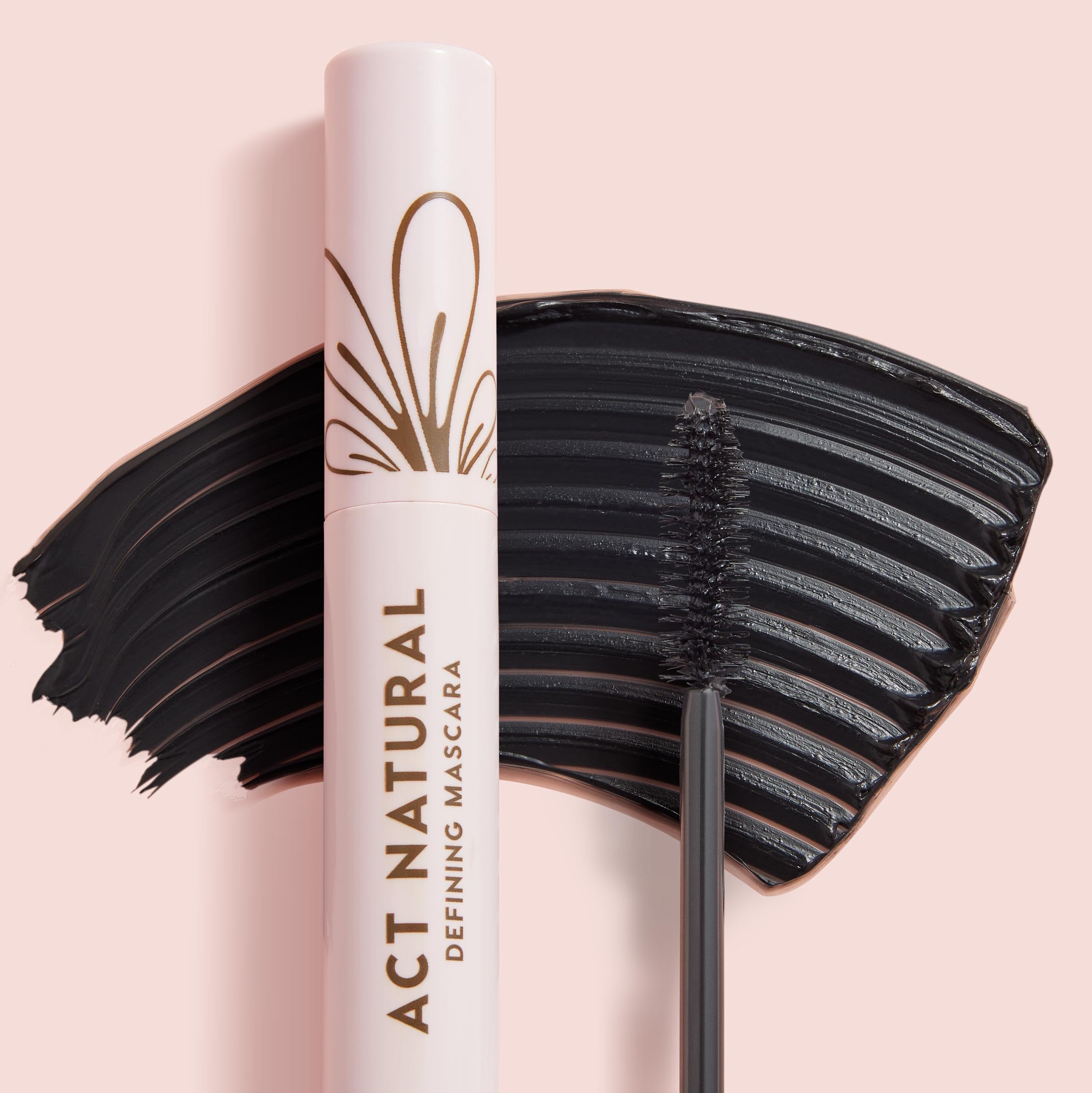 ColourPop Act Natural Defining Mascara finished lashes with wispy definition.