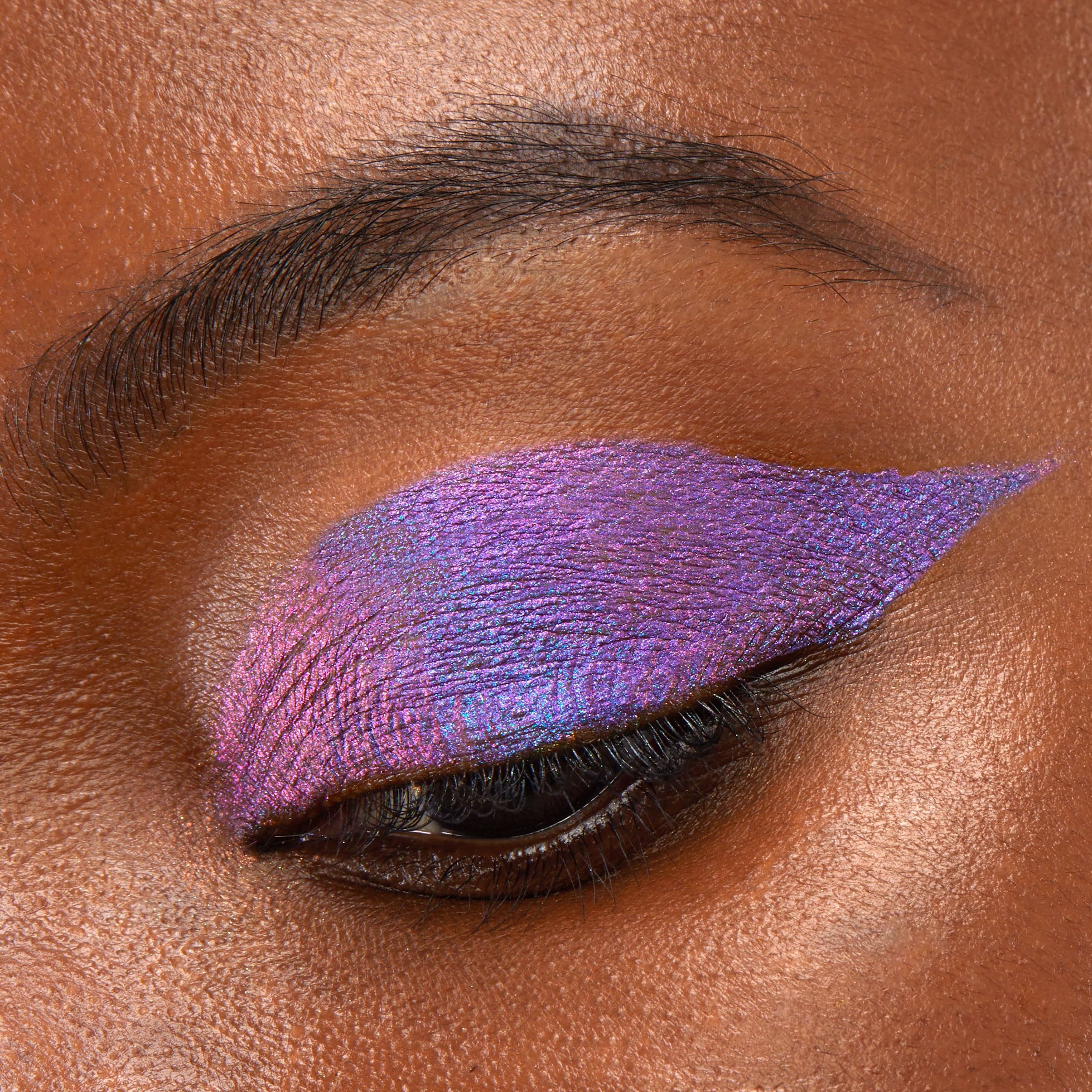 ColourPop Chrome Liquid Shadow layered over powder delivers dramatic, long-lasting finish.