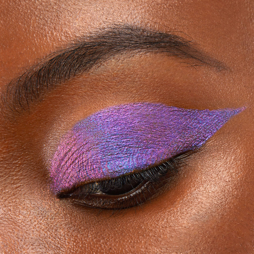 ColourPop Chrome Liquid Shadow layered over powder delivers dramatic, long-lasting finish.