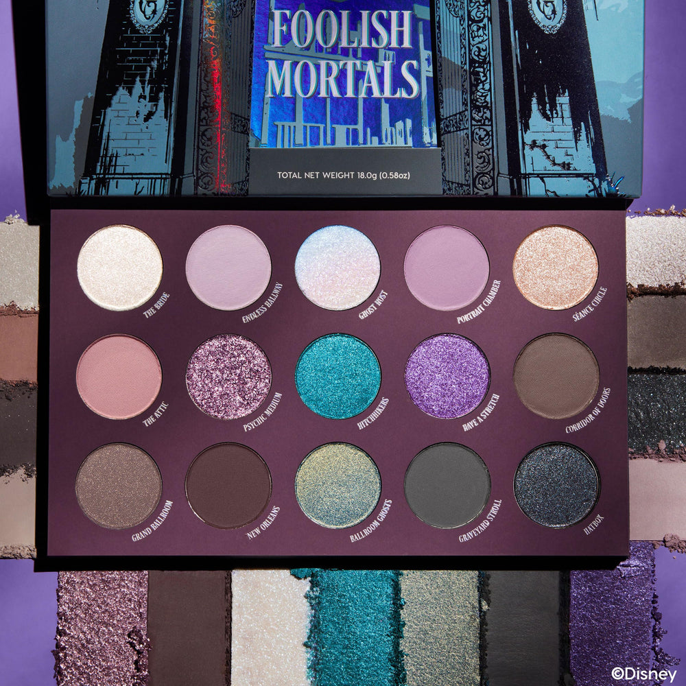 ColourPop Haunted Mansion palette shades row, showing neutrals, greys, and bold color options for versatile looks.