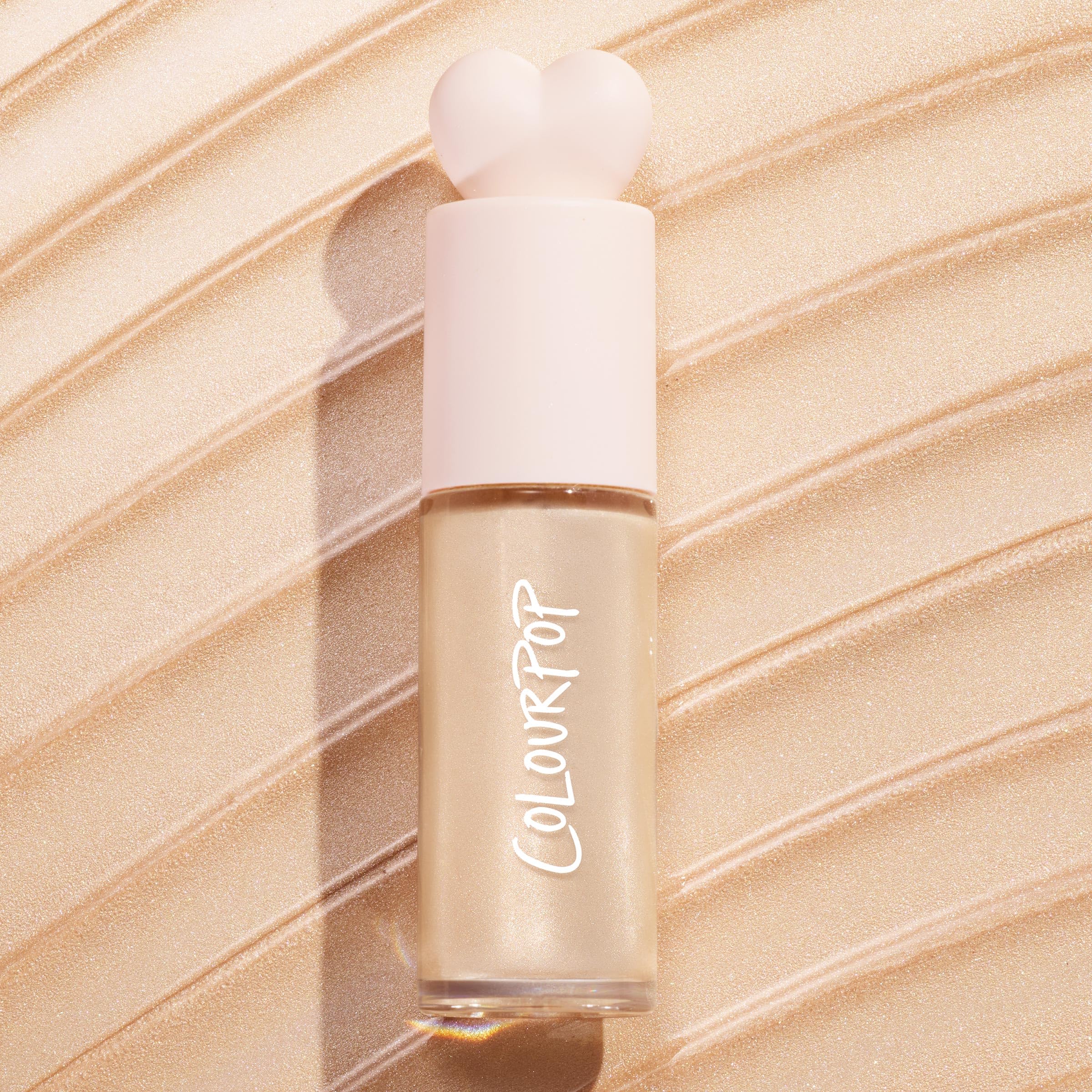 ColourPop Hi-Lite body-glow blends across shoulders for cohesive luminosity