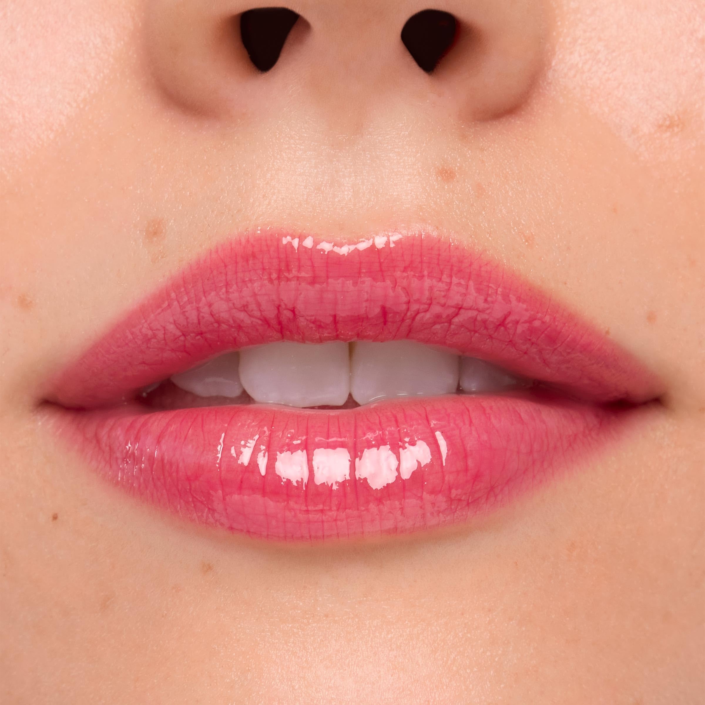 ColourPop Stitch gloss layered over lip liner for defined fullness.