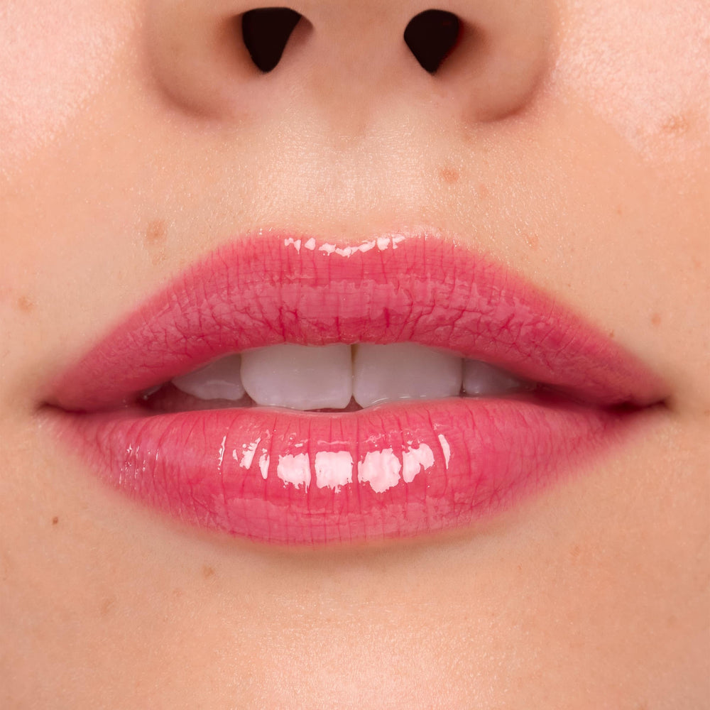 ColourPop Stitch gloss layered over lip liner for defined fullness.
