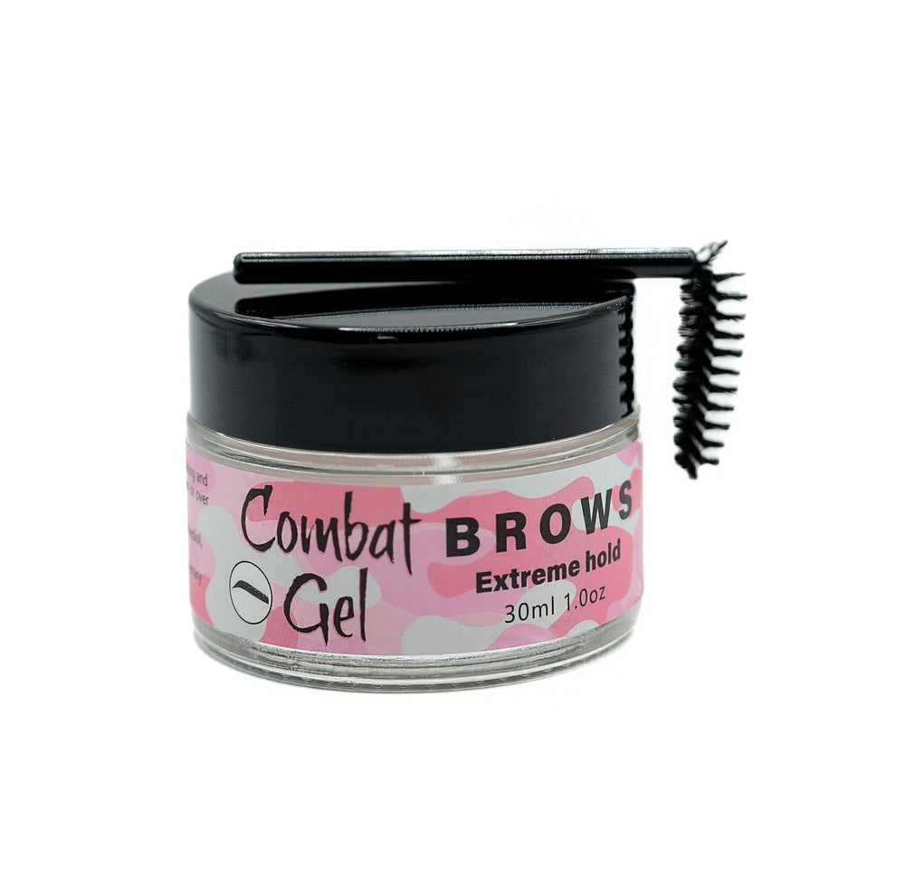 Combat Brow Gel brush in action for precise brow shaping.