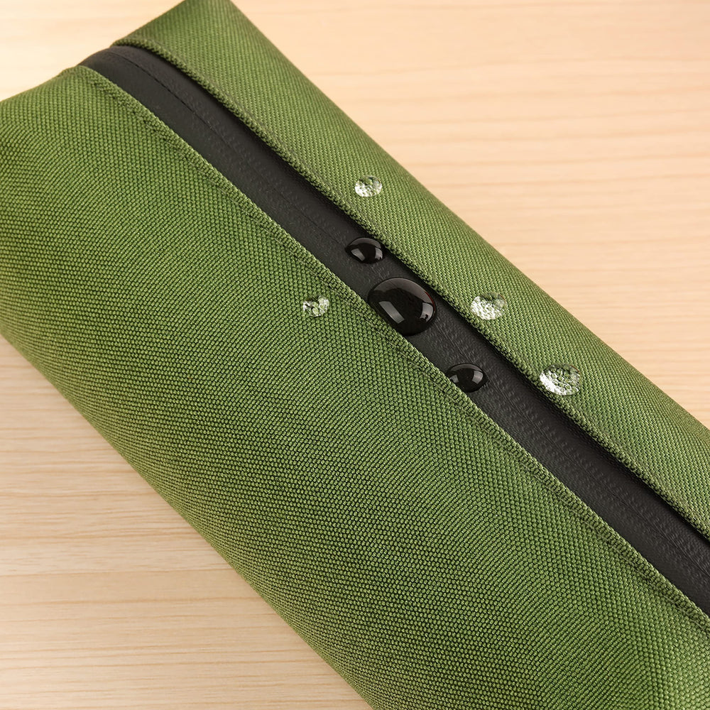 Comfyable mini Dopp kit bag opened demonstrates space for longer items.