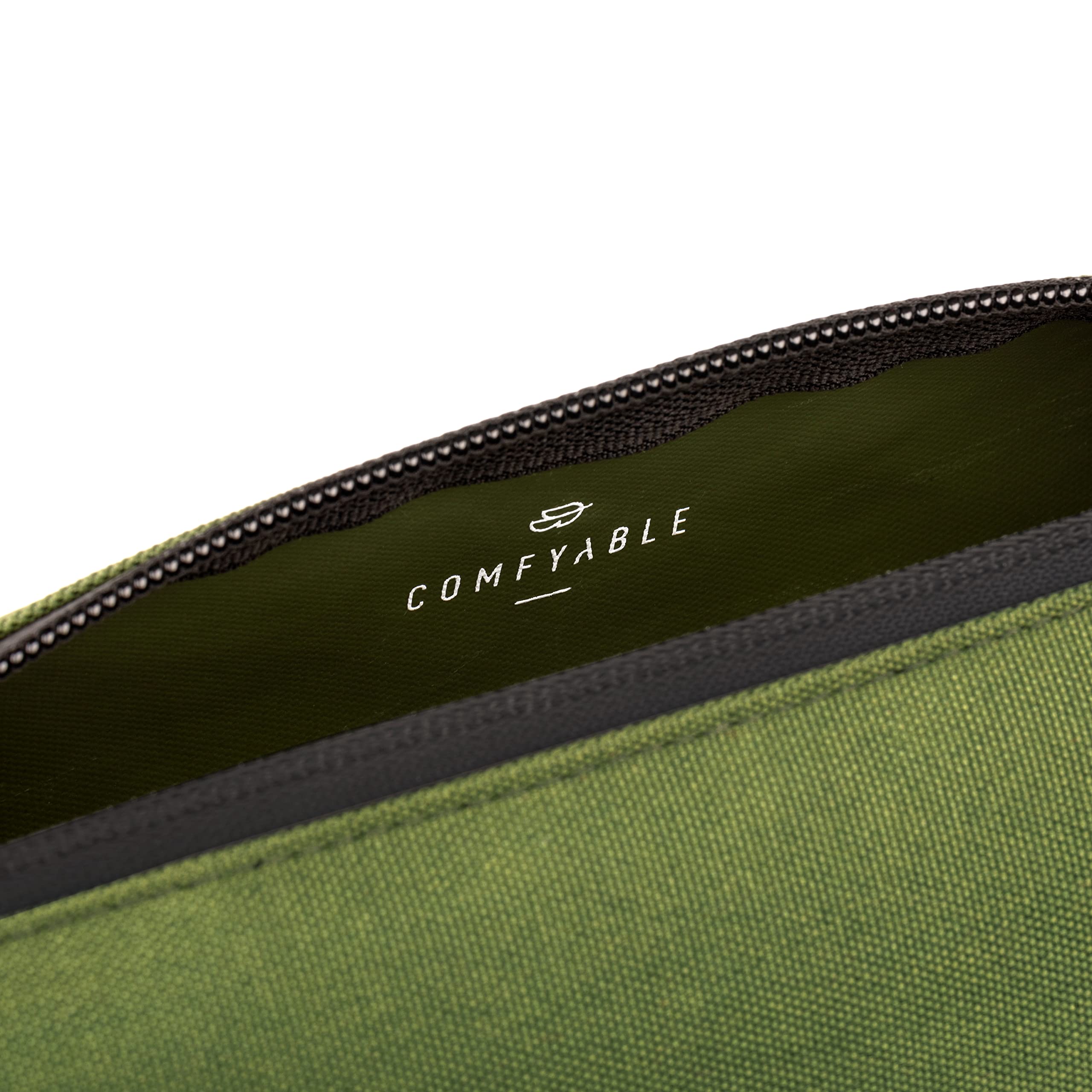 Comfyable slim mini toothbrush case green close-up, lightweight travel companion.