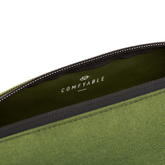 Comfyable slim mini toothbrush case green close-up, lightweight travel companion.