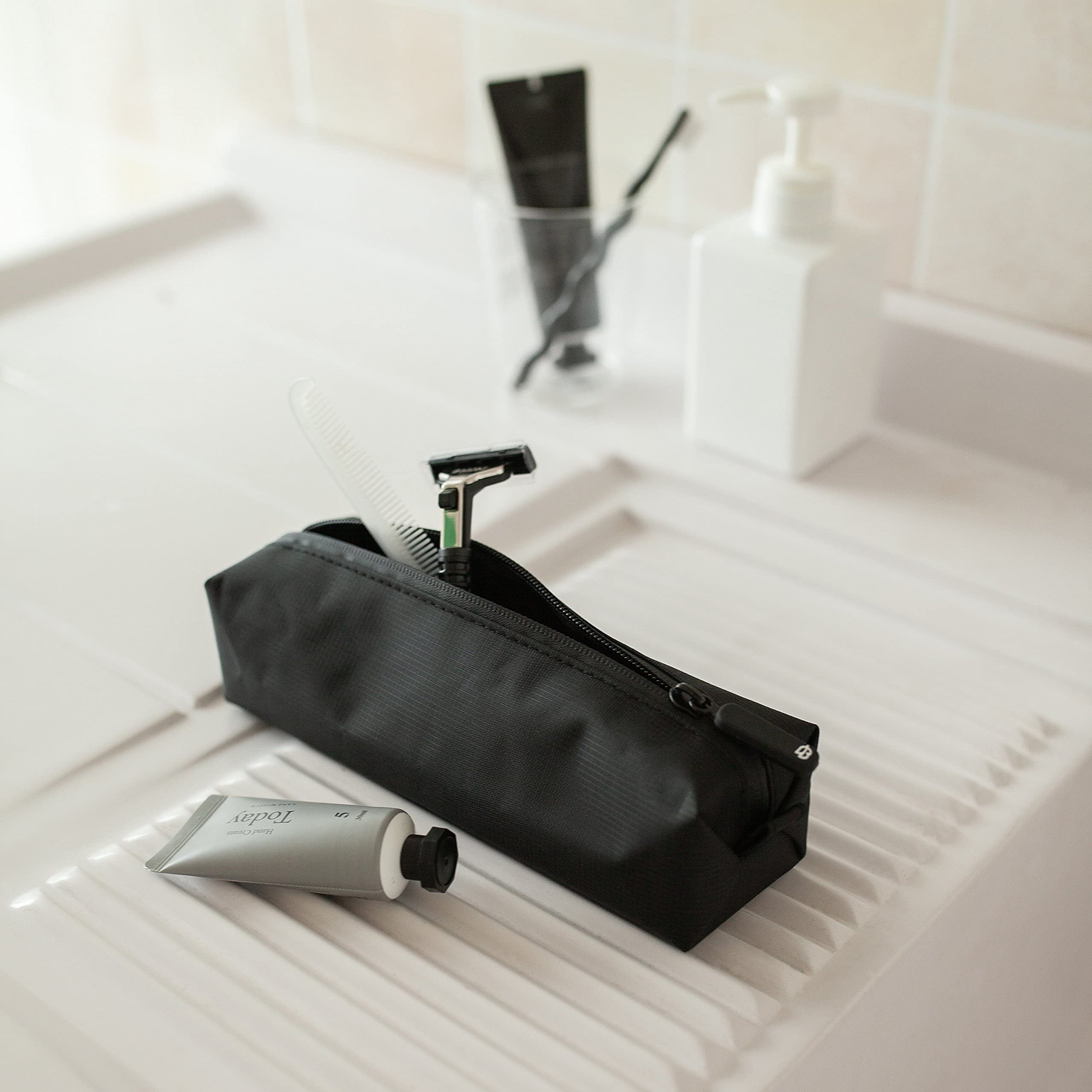 Comfyable Small Toiletry Bag organizes cables and toiletries for business trips and weekend getaways