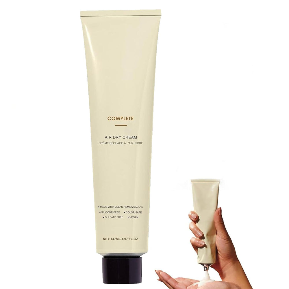 Complete Air Dry Cream bottle closeup highlights frizz control and lightweight formula
