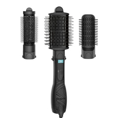 Conair Curl Collective oval brush gliding through curls for smooth volume