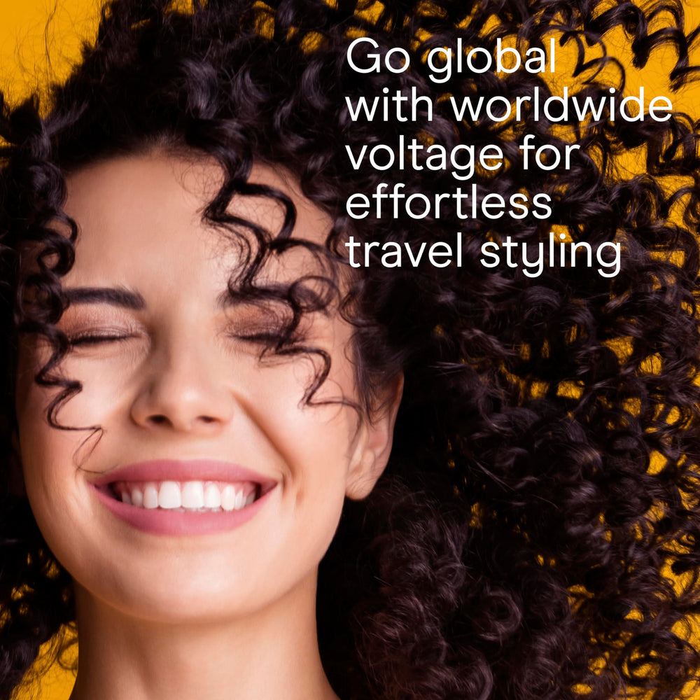 Conair curling iron displays 30 heat settings for versatile styling.