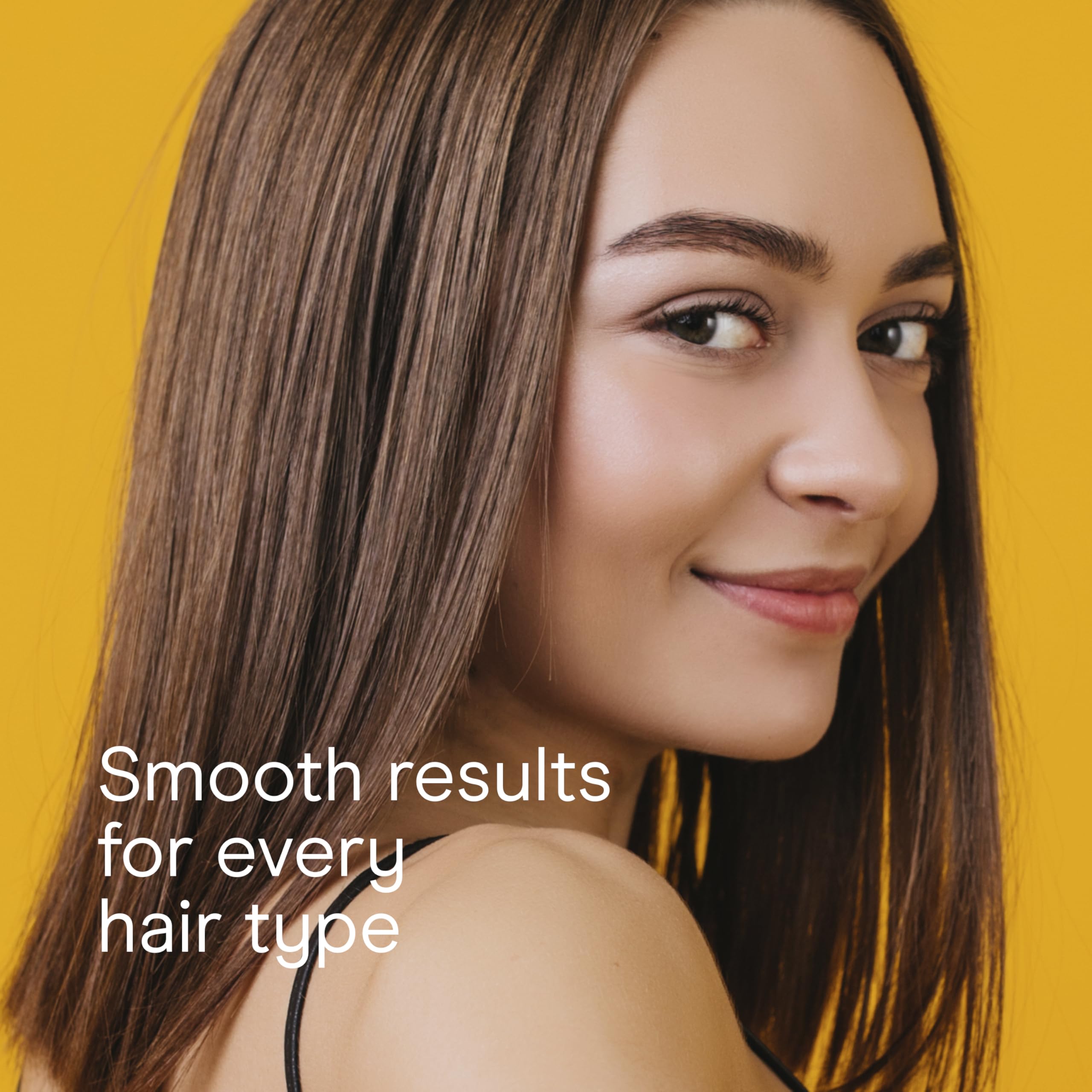 Conair double ceramic straightening brush in action styling hair for a smooth finish