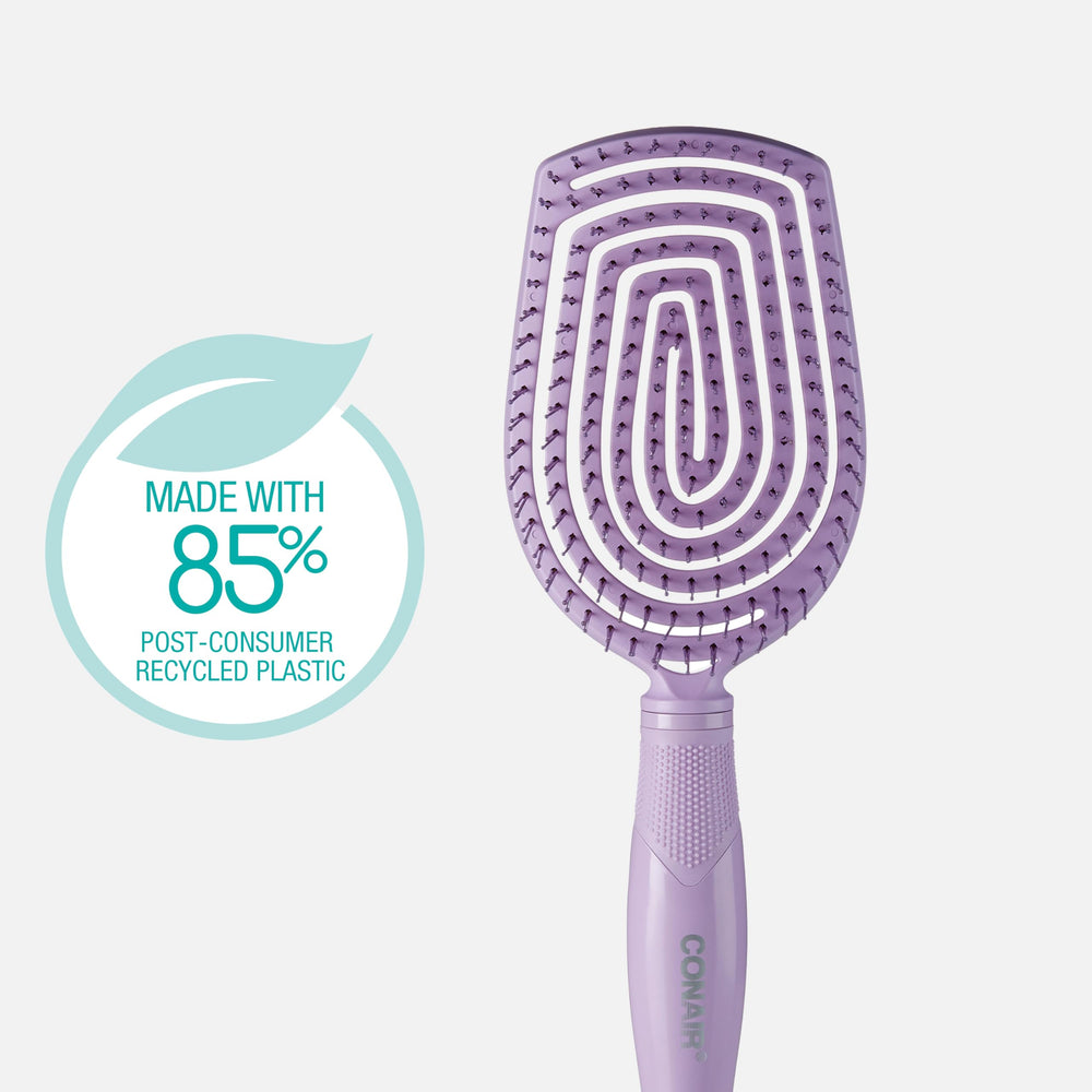 Conair dual-flex bristles close-up highlighting gentle buildup removal and smooth detangling.