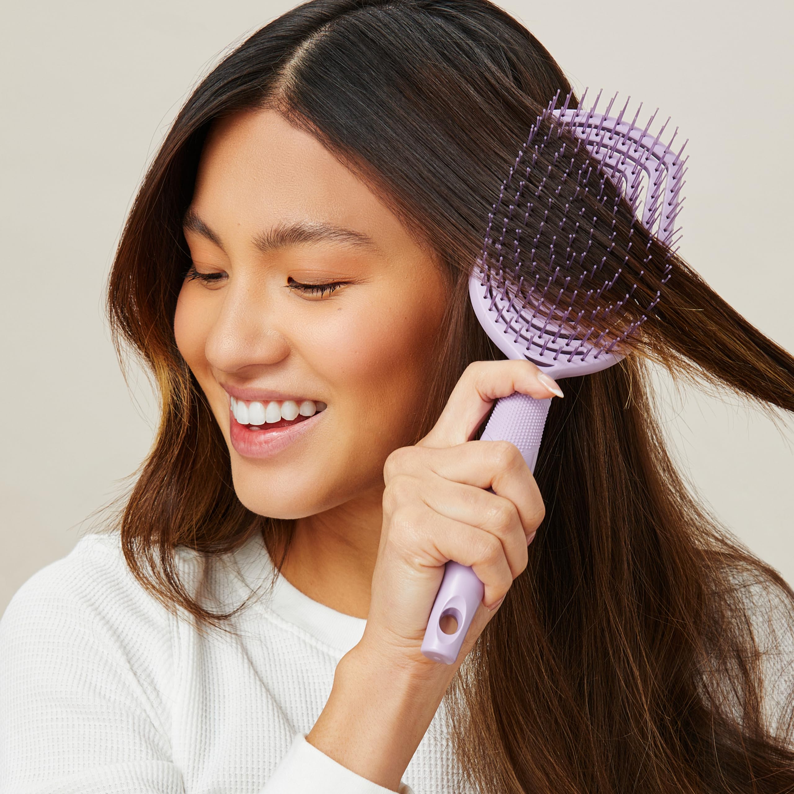 Conair eco-friendly post-consumer plastic emphasis image for sustainable styling.