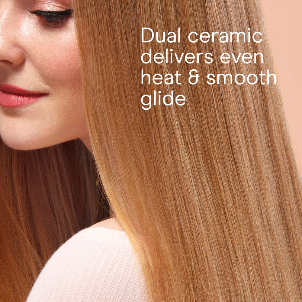 Conair flat iron in use producing sleek looks on hair.