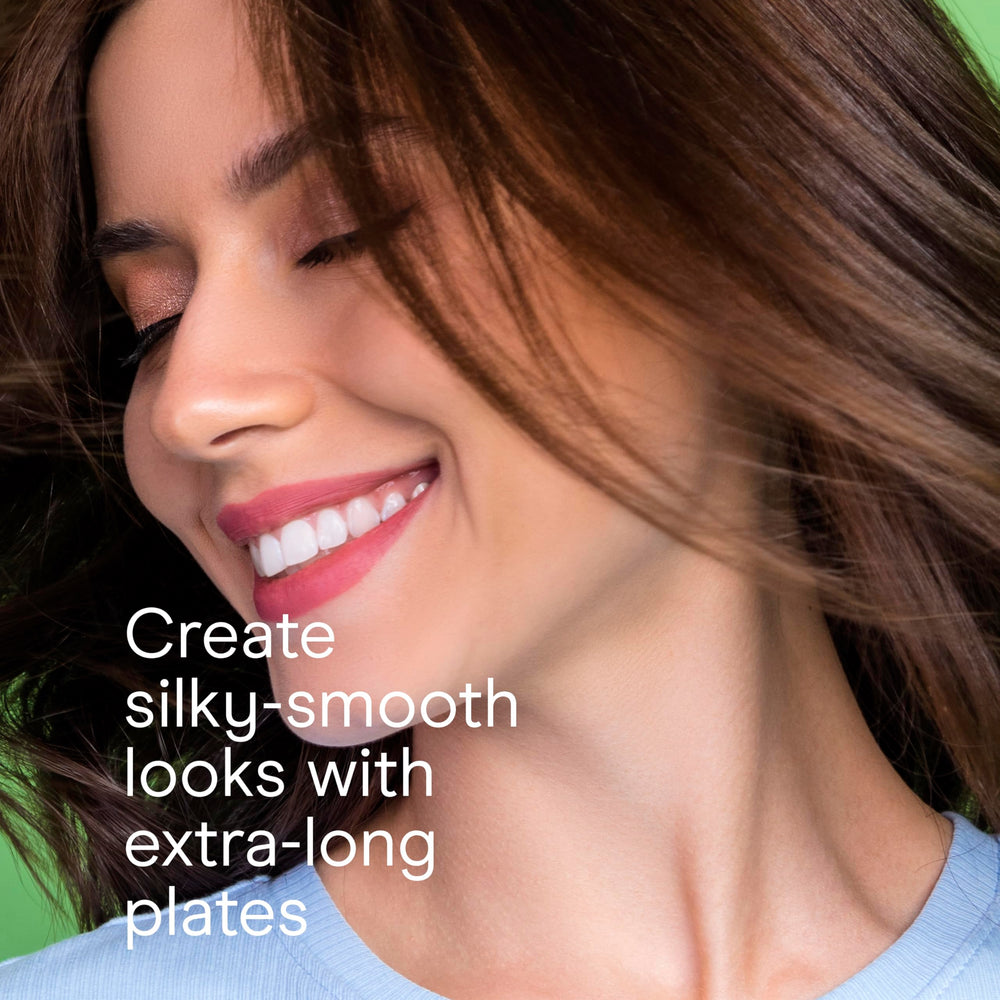 Conair flat iron with dual voltage for travel-friendly styling worldwide.