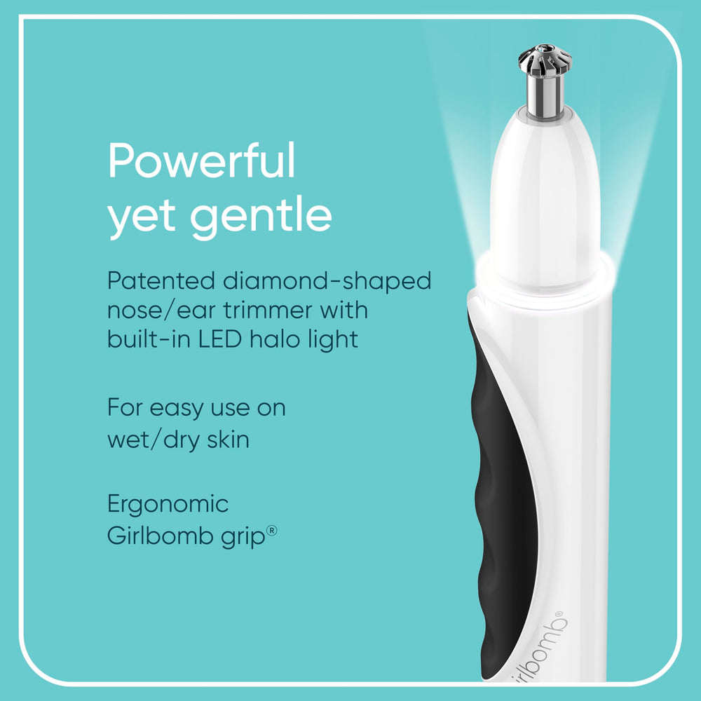 Conair GIRLBOMB ergonomic grip held in palm for comfortable grooming.