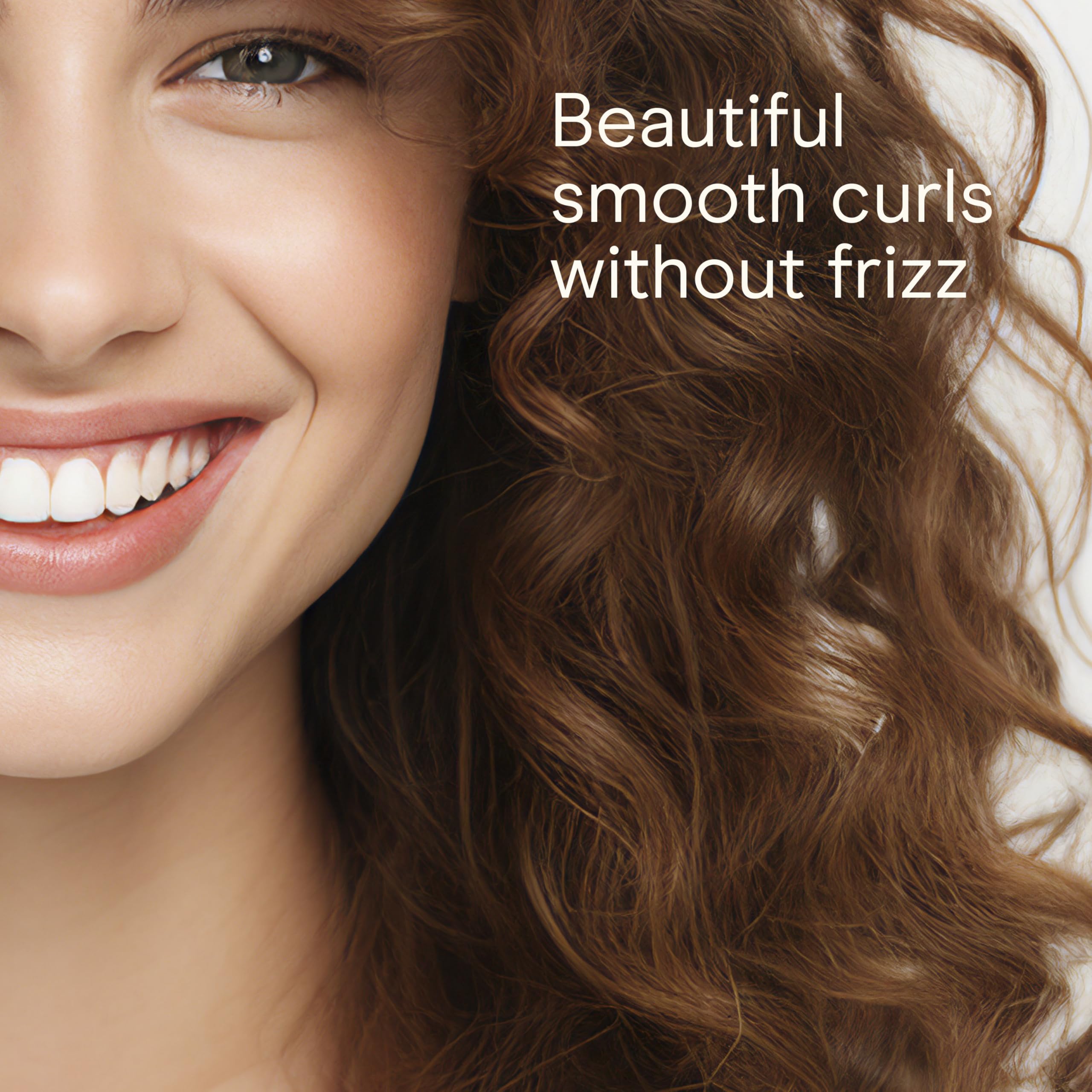 Conair Infiniti Pro curling iron creates defined curls with a smooth, glossy finish.