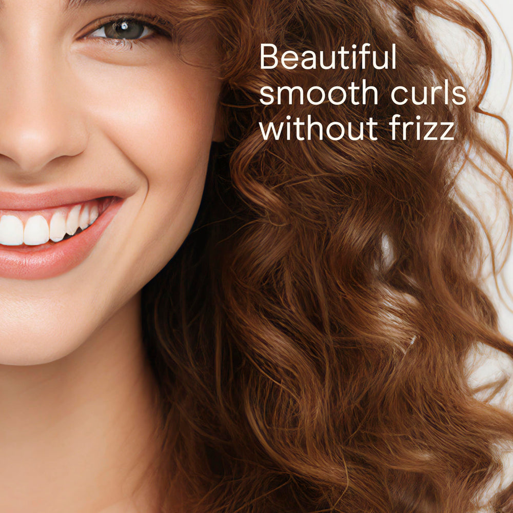 Conair Infiniti Pro curling iron creates defined curls with a smooth, glossy finish.