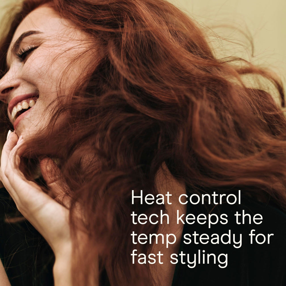 Conair INFINITI PRO digital LED display for precise temperature control during styling.