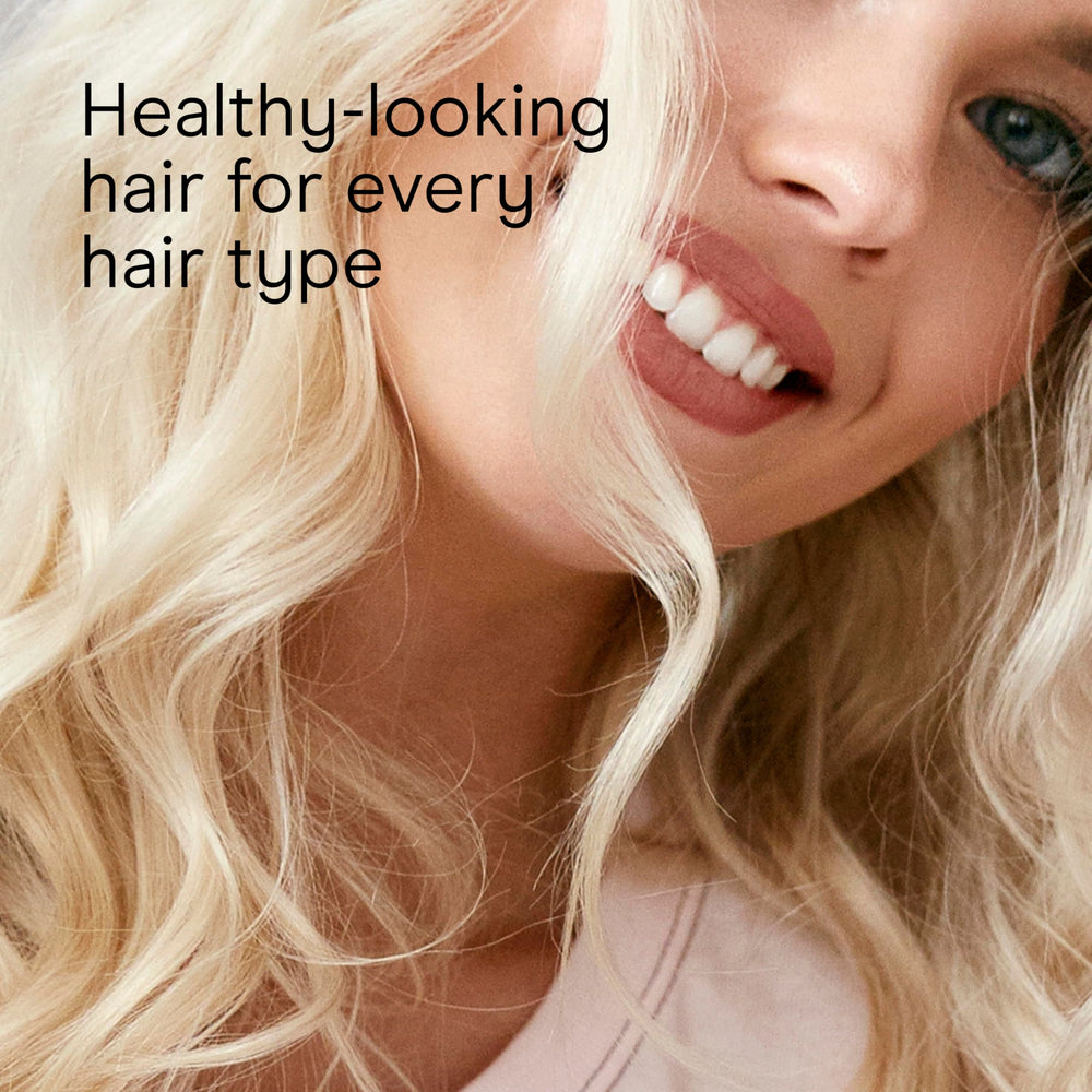 Conair Infiniti Pro tourmaline helps reduce frizz and boost shine during styling.