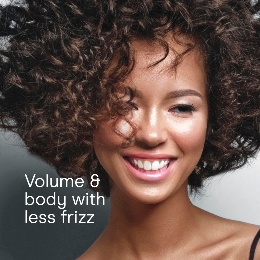 Conair InfinitiPRO SmoothWrap mint six-heat-speed settings offer tailored control for different hair types.