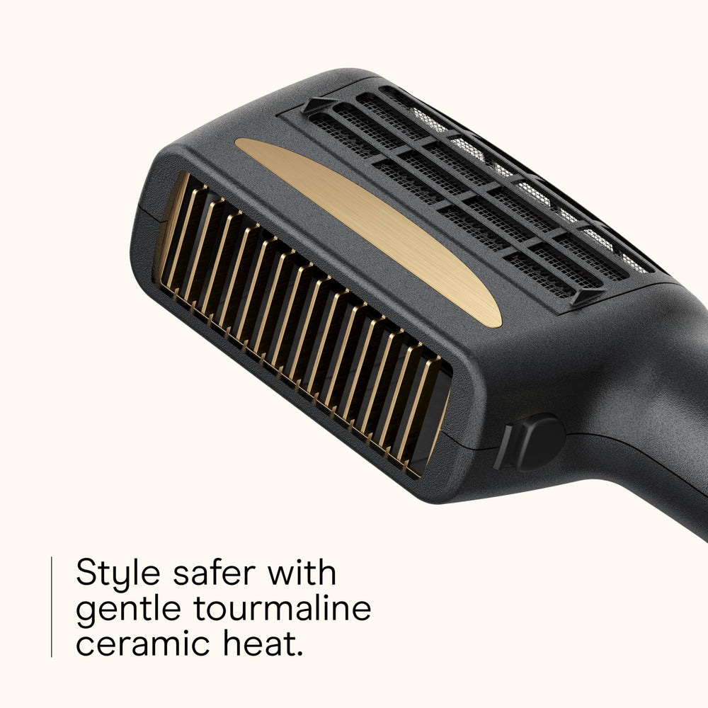 Conair Infinitipro wide-tooth thermal comb aids detangling with even heat.