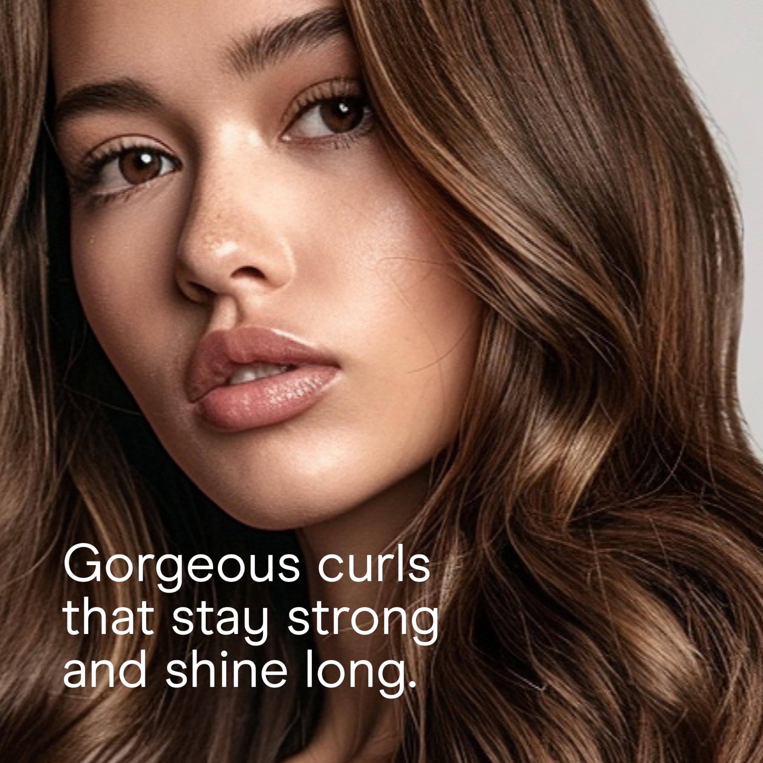 Conair Instant Heat curling iron extra-long cool tip for safer handling.