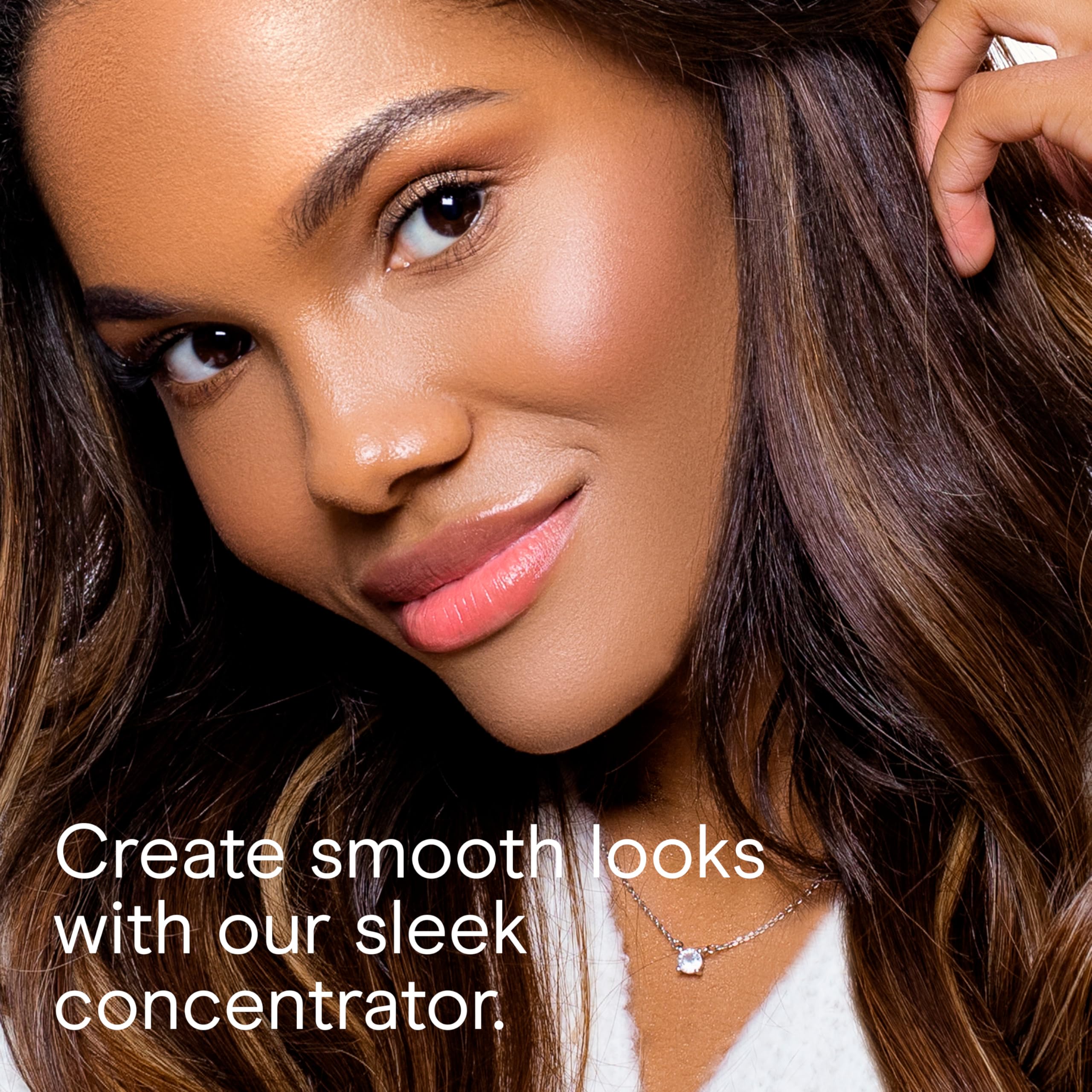 Conair Concentrator nozzle attached for precise styling and frizz control.