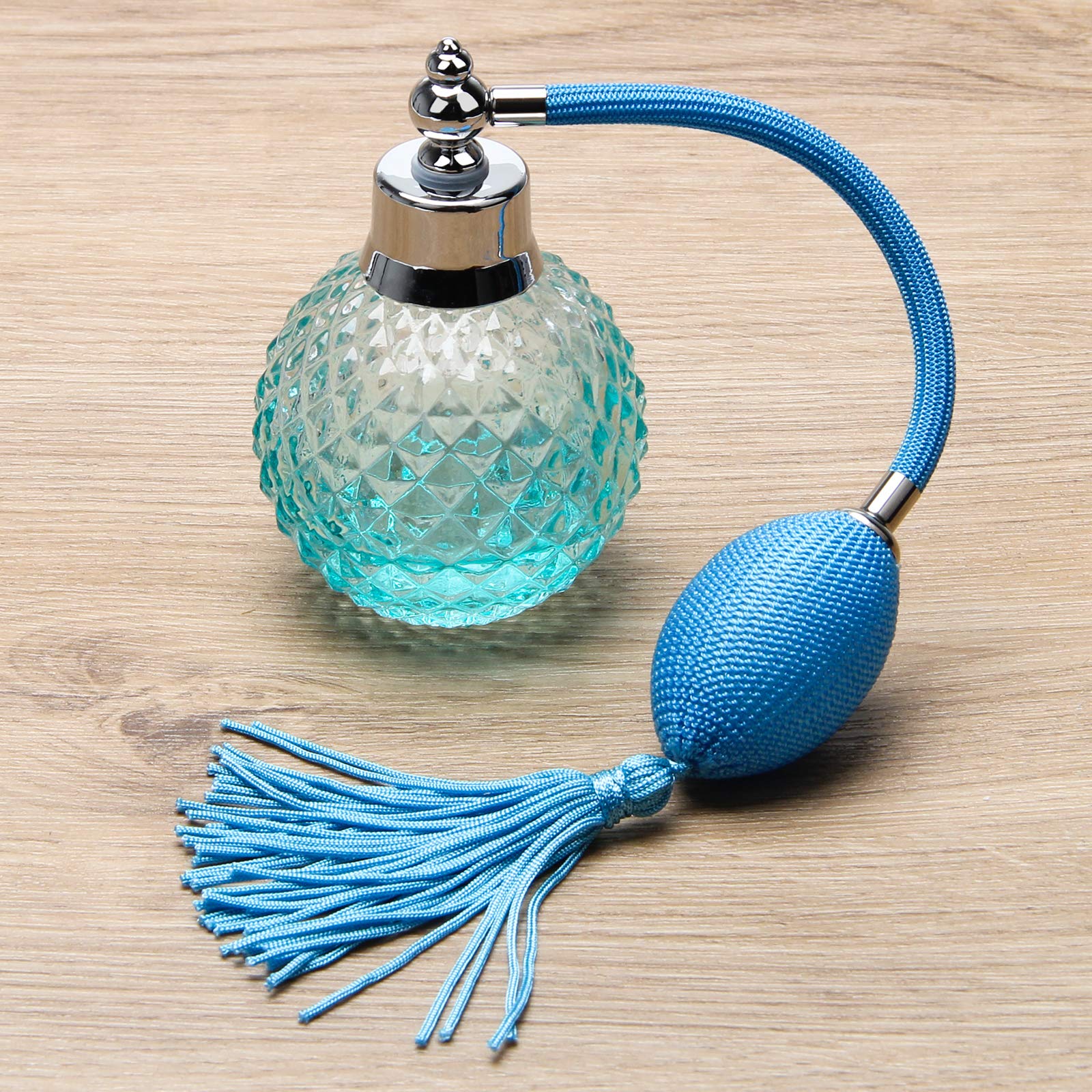 Coolrunner blue crystal bottle on surface for travel and display