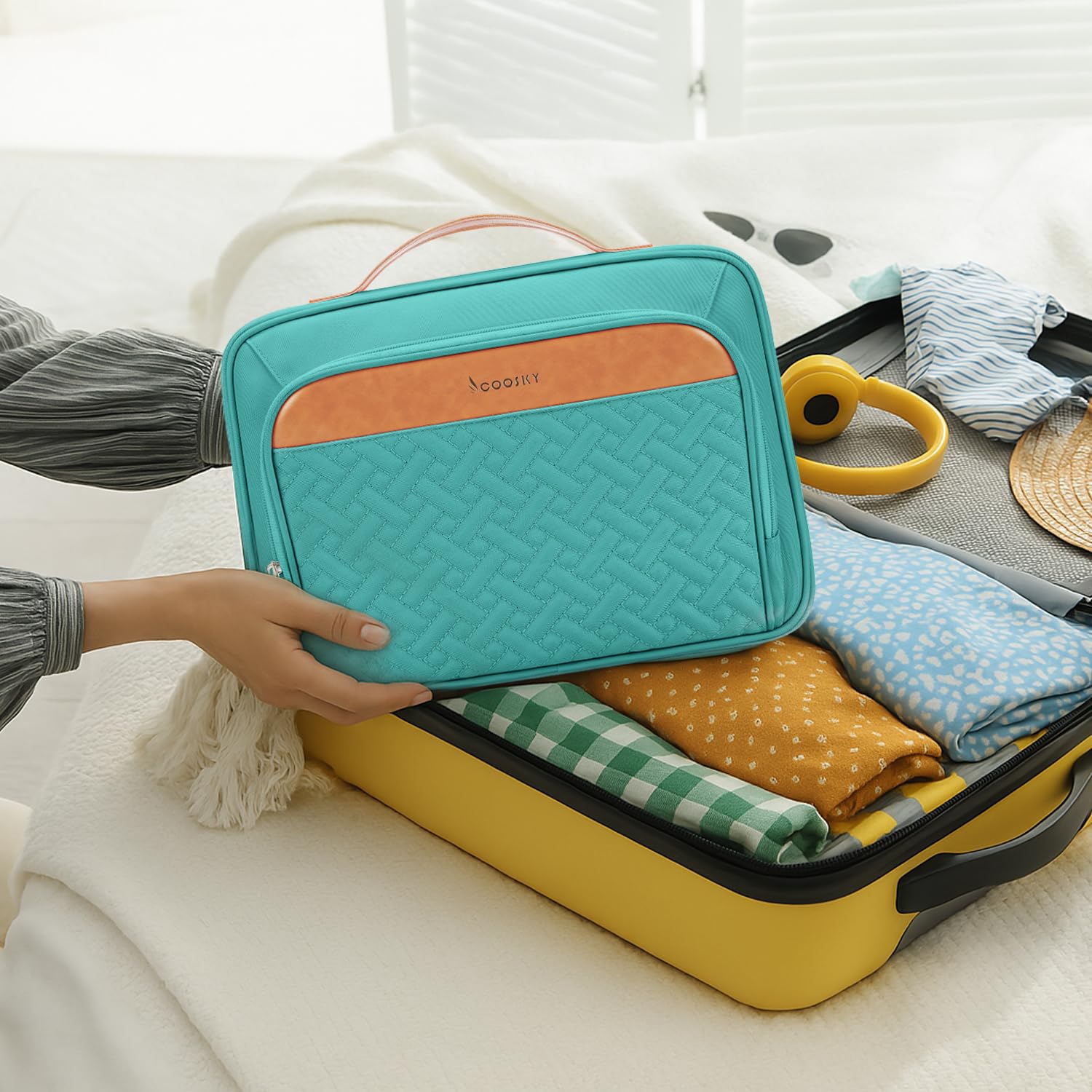 COOSKY travel hanging toiletry bag open-hanging shows accessible compartments for quick use.