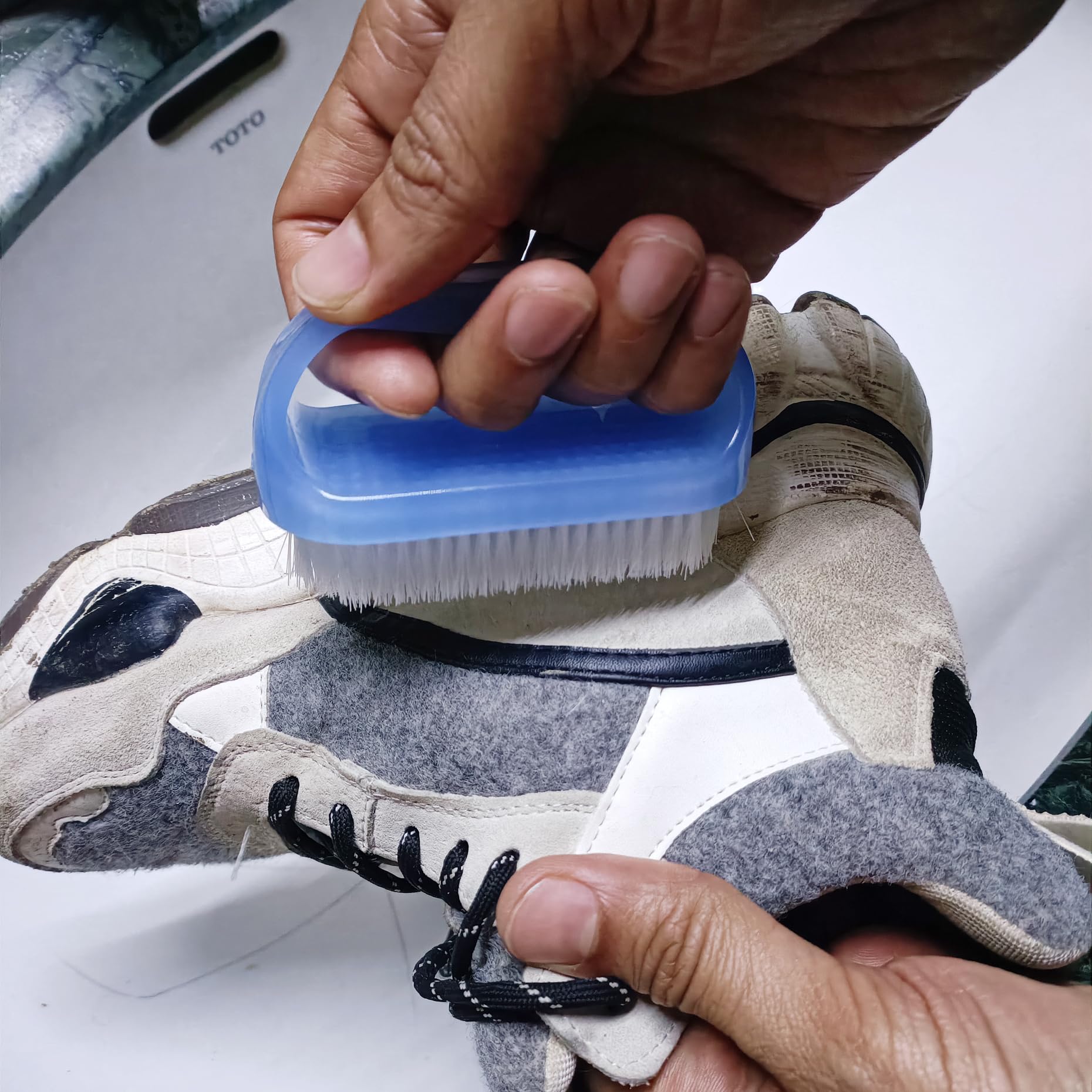 Coralpearl travel-friendly nail brush kit fits toiletry bags.