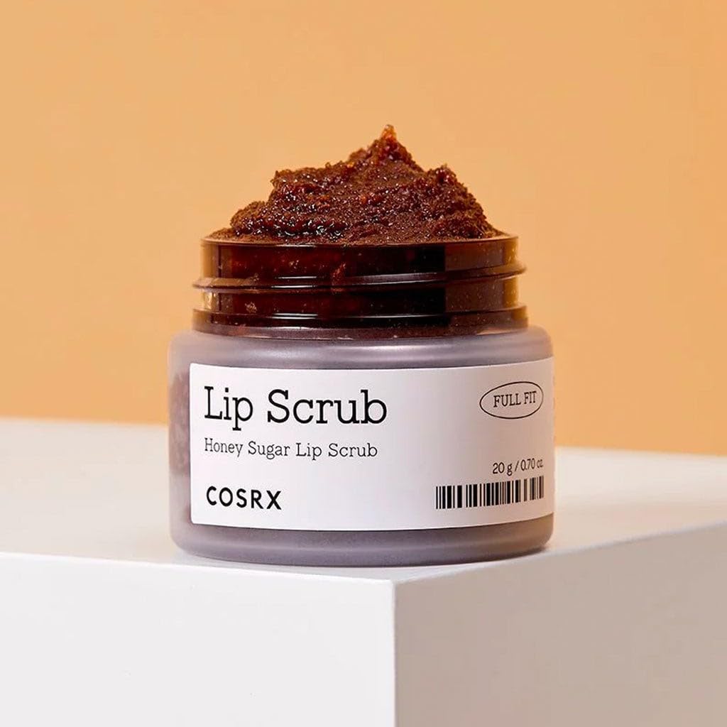 COSRX honey sugar lip scrub application demonstrates gentle exfoliation for smoother lips.
