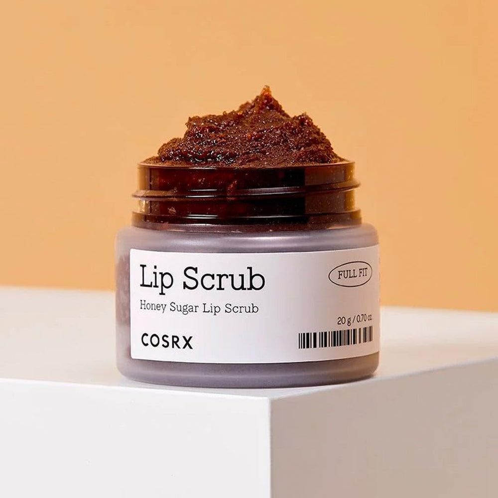 COSRX honey sugar lip scrub application demonstrates gentle exfoliation for smoother lips.