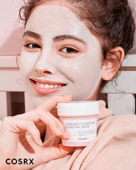 COSRX pink-charcoal-mask-color-change-pink-gray-white demonstrates color-changing therapy.
