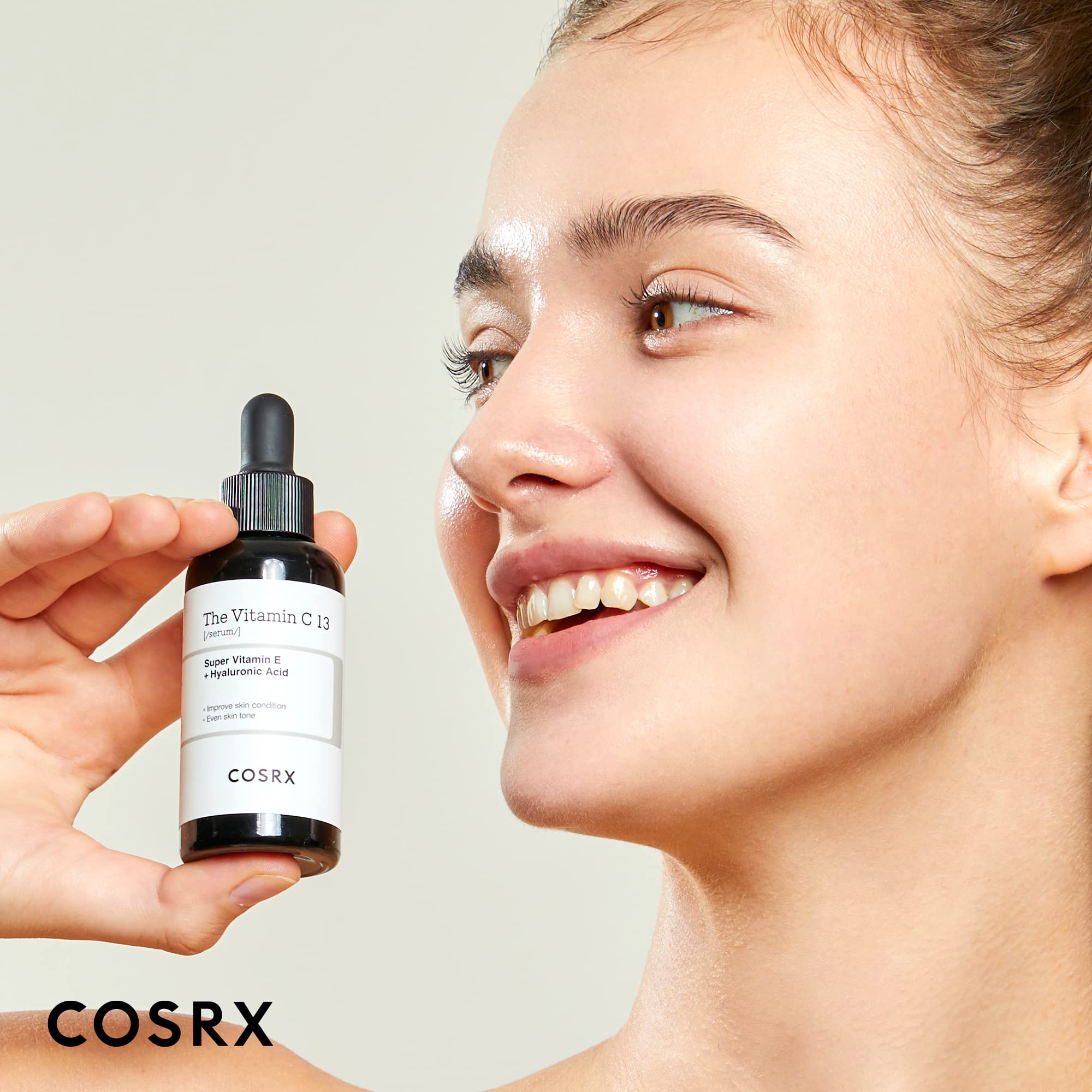 COSRX Pure Vitamin C 13% serum dispensed on hand demonstrating lightweight texture