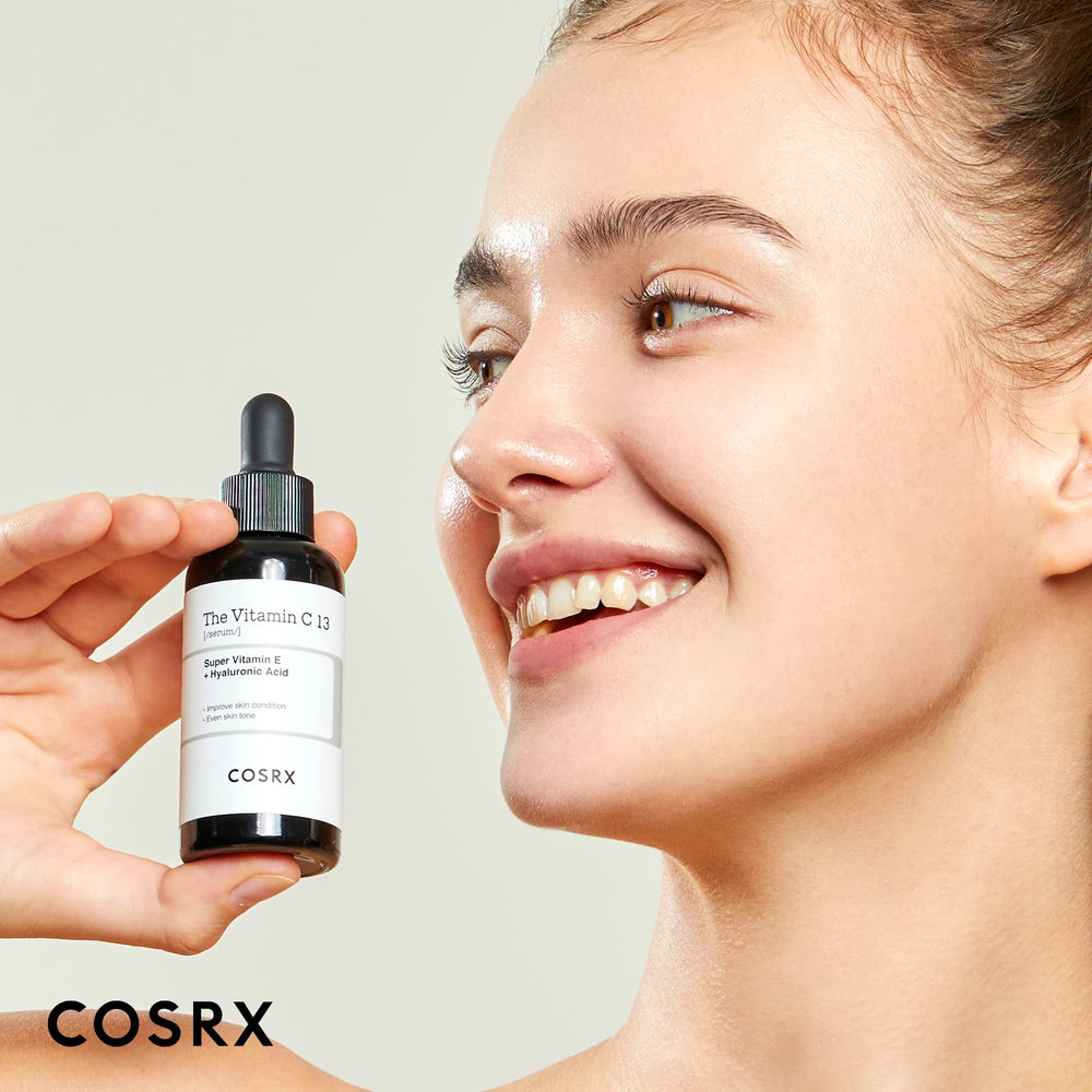 COSRX Pure Vitamin C 13% serum dispensed on hand demonstrating lightweight texture