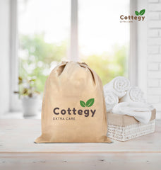 Cottegy loofah gloves left thumb hole for secure grip during scrubbing.
