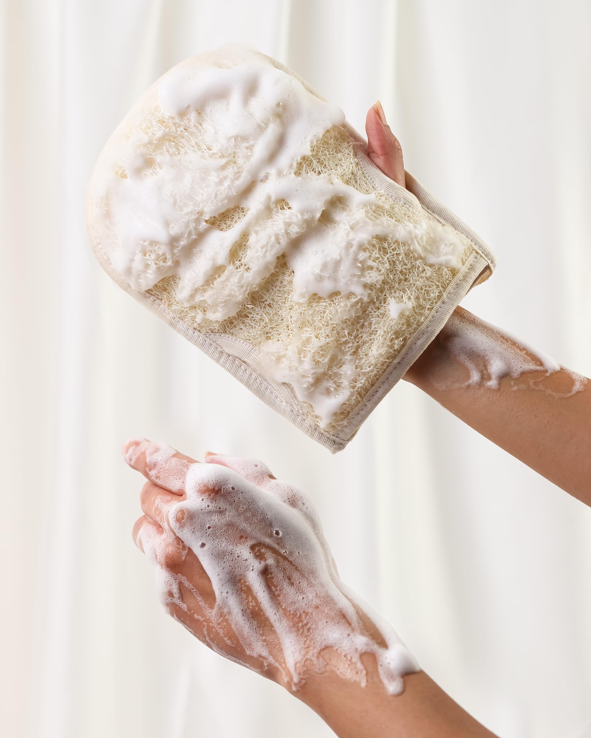 Cottegy premium exfoliating loofah gloves back view shows contoured cleansing for hard-to-reach areas.