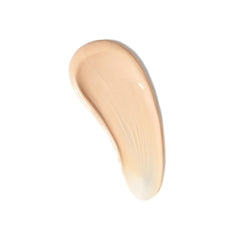 CoTZ Flawless Complexion SPF50 texture closeup reveals creamy, lightweight feel without white cast.