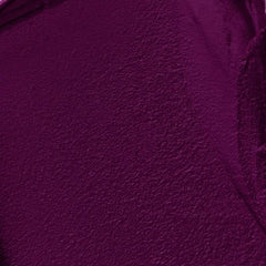 CoverGirl Exhibitionist lip swatch on lips highlights transfer-proof, kiss-proof performance.