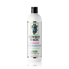 Cowboy Magic Shampoo poured over a wet coat delivering instant cleansing action.