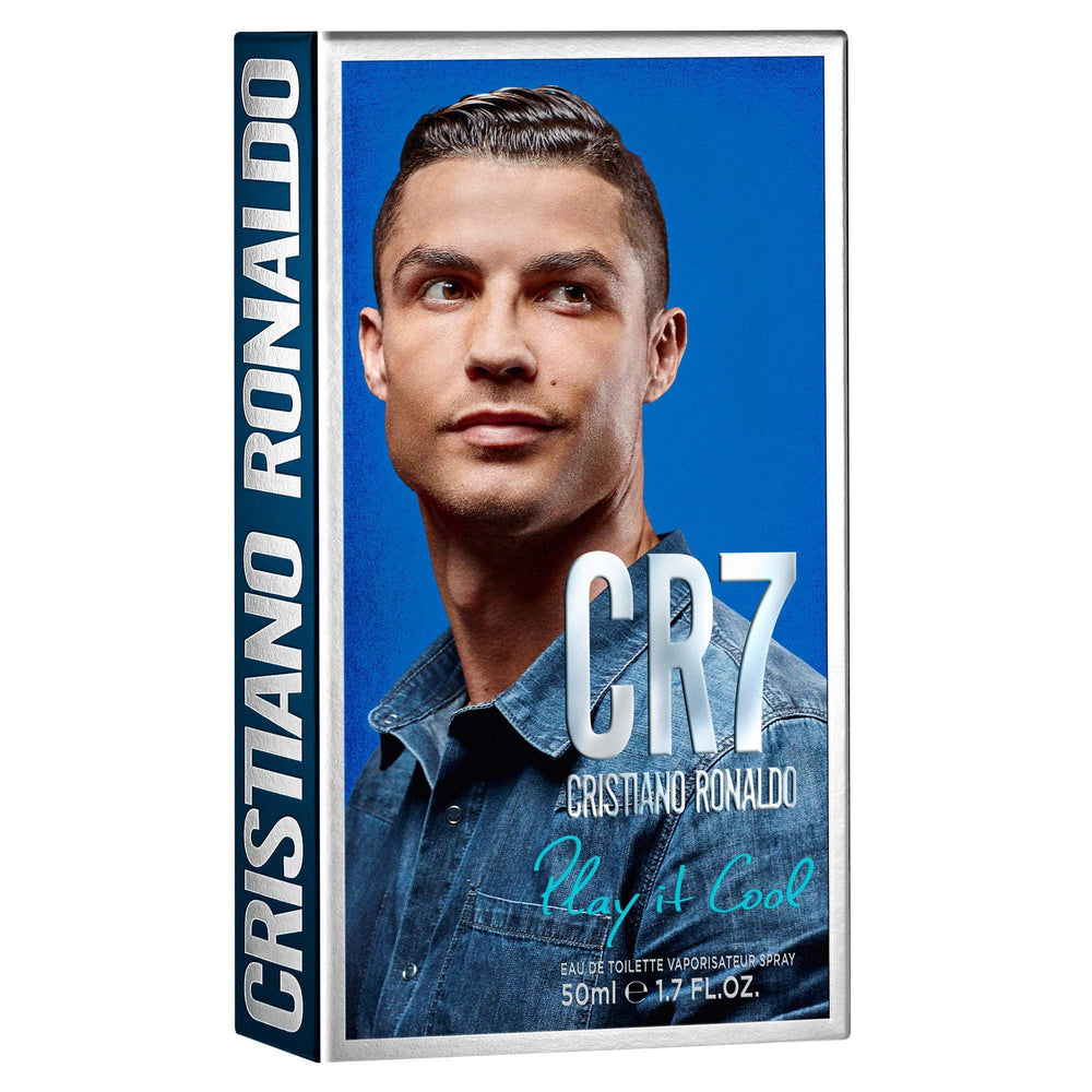 CR7 Play It Cool wooden display suggests premium masculine fragrance presentation.