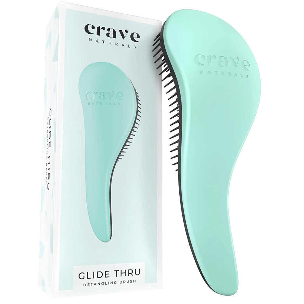 Crave Naturals Biggie Glide Thru brush detangling dry hair for easy styling.