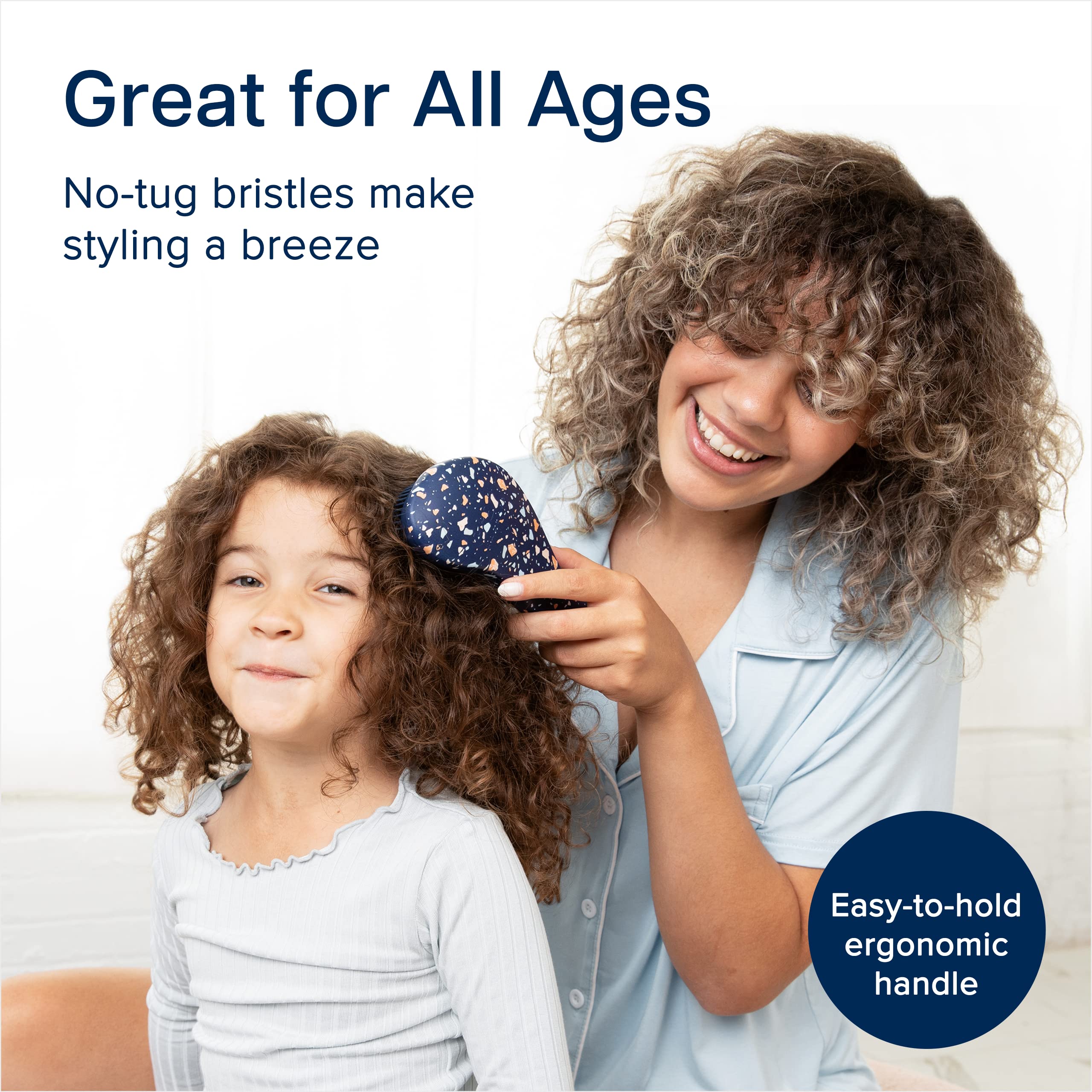 Crave Naturals Glide Thru brush on curly hair for smooth detangling