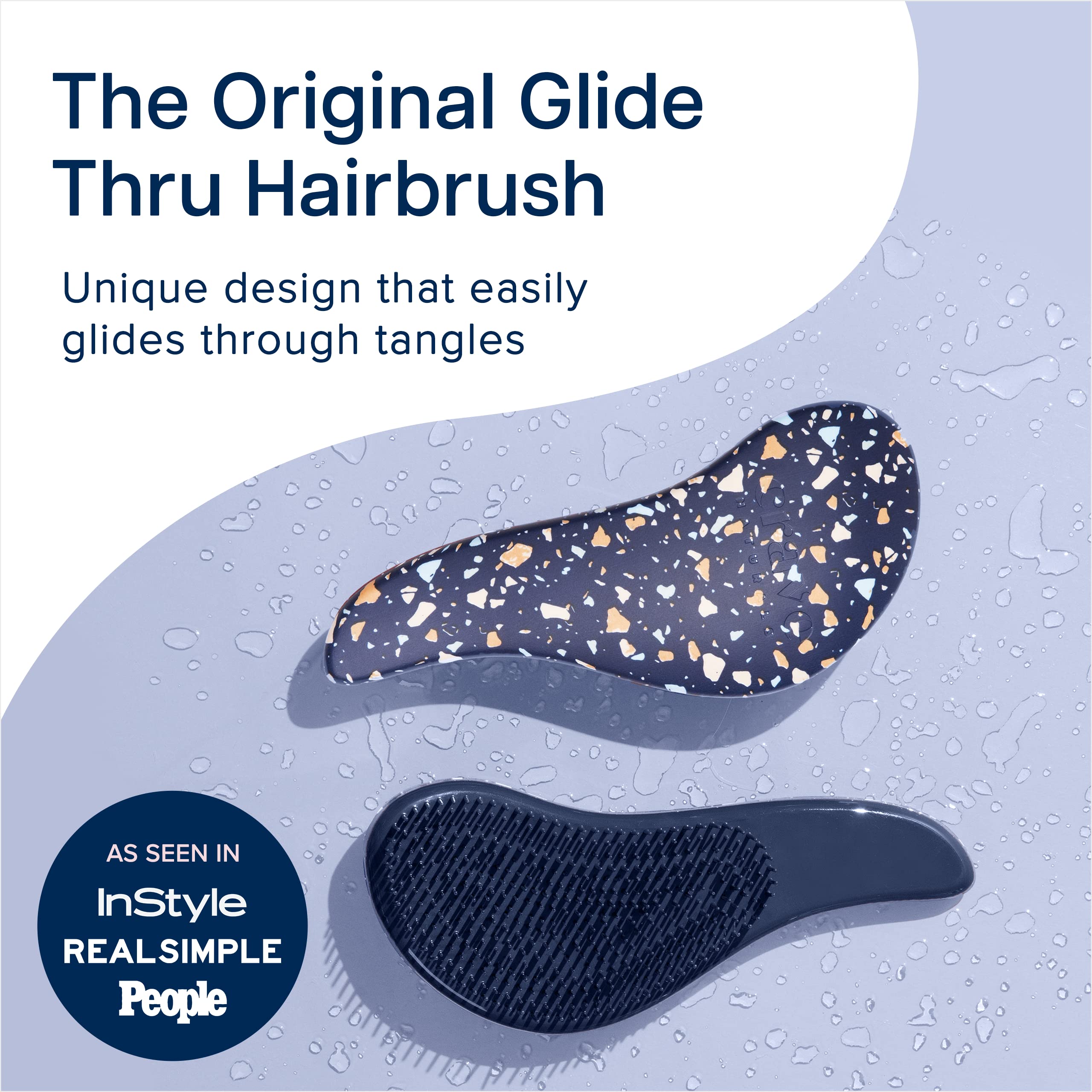 Crave Naturals Glide Thru brush in hand highlights ergonomic design for comfortable detangling